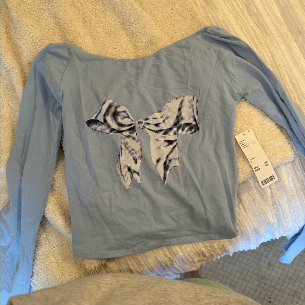 Blue long sleeve bow top